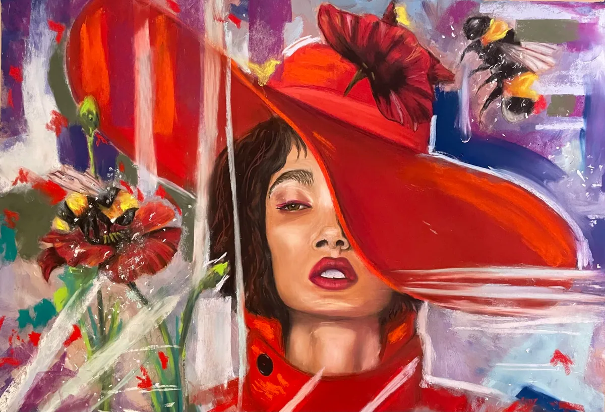 Woman in a wide red hat and red coat, with bumblebees and a red flower beside her.